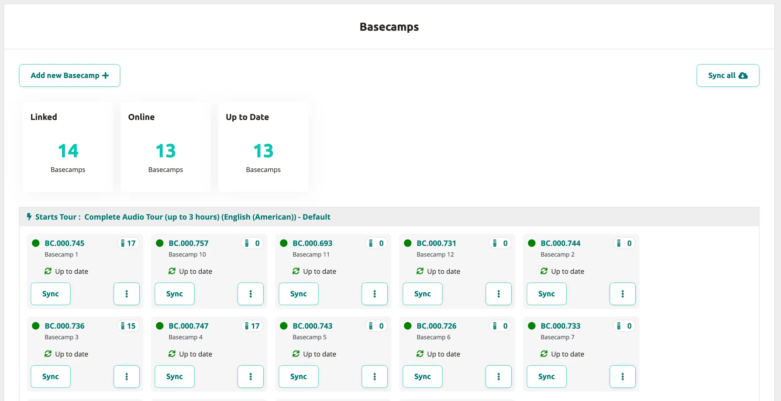 Basecamps listing page showing 14 units in a grid with autostart tour, serial numbers, sync status, and Podcatcher counts.